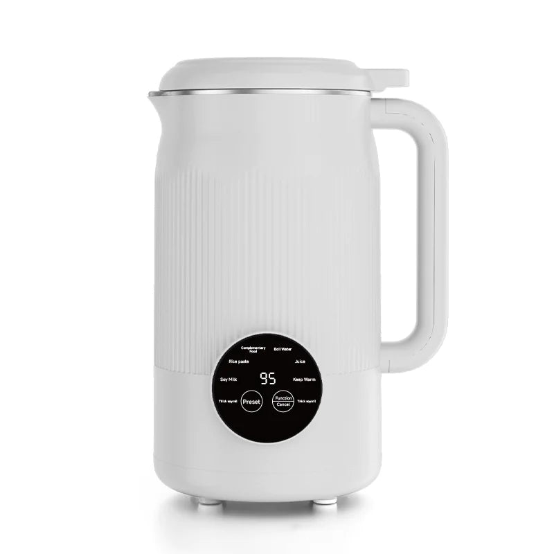 Portable blender mixing fruit smoothie on kitchen counter