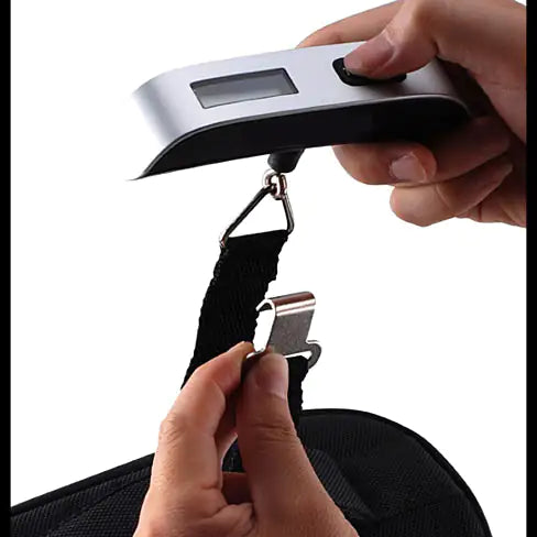 Luggage scale with temperature sensor weighing suitcase