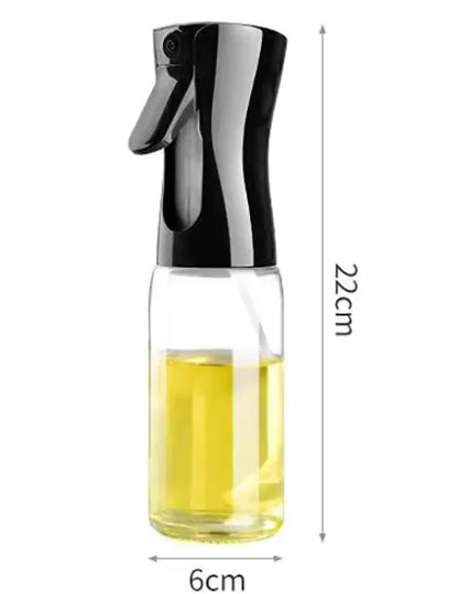 Portable cooking oil sprayer bottle filled with olive oil