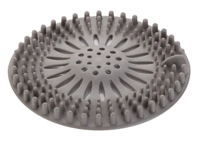 Gray silicone brush on a white background